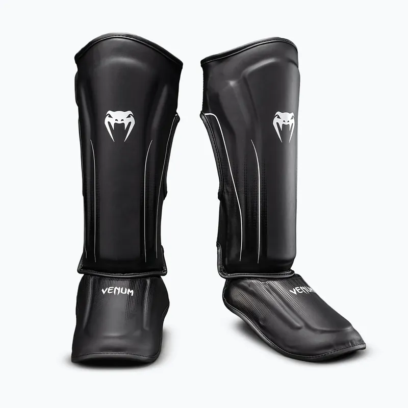 Oblíbený Chrániče holení a chodidel Venum Stealth Shin black/white Novinka