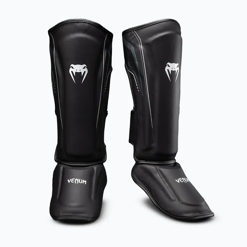 Chrániče holení a chodidel Venum Streamline Shin black/white Novinka Objednat Nyní
