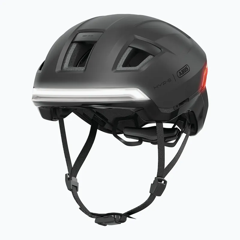 Cyklistická helma s blinkry ABUS Hyp-E volcano titan Ihned K Objednání